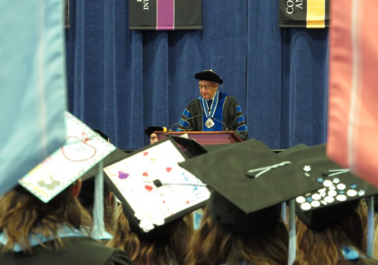 Western Washington University President Sabah Randhawa speaks to the crowd to open the third and final winter commencement ceremony for roughly 670 Western graduates and returning alums at Carver Gymnasium on Dec. 10.