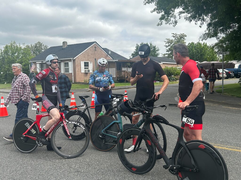 From left, Ben Shaklee, Beau Whitehead, Patrick Laird and Leighton Overson chat after all finishing in the top 10 of the road bike leg.