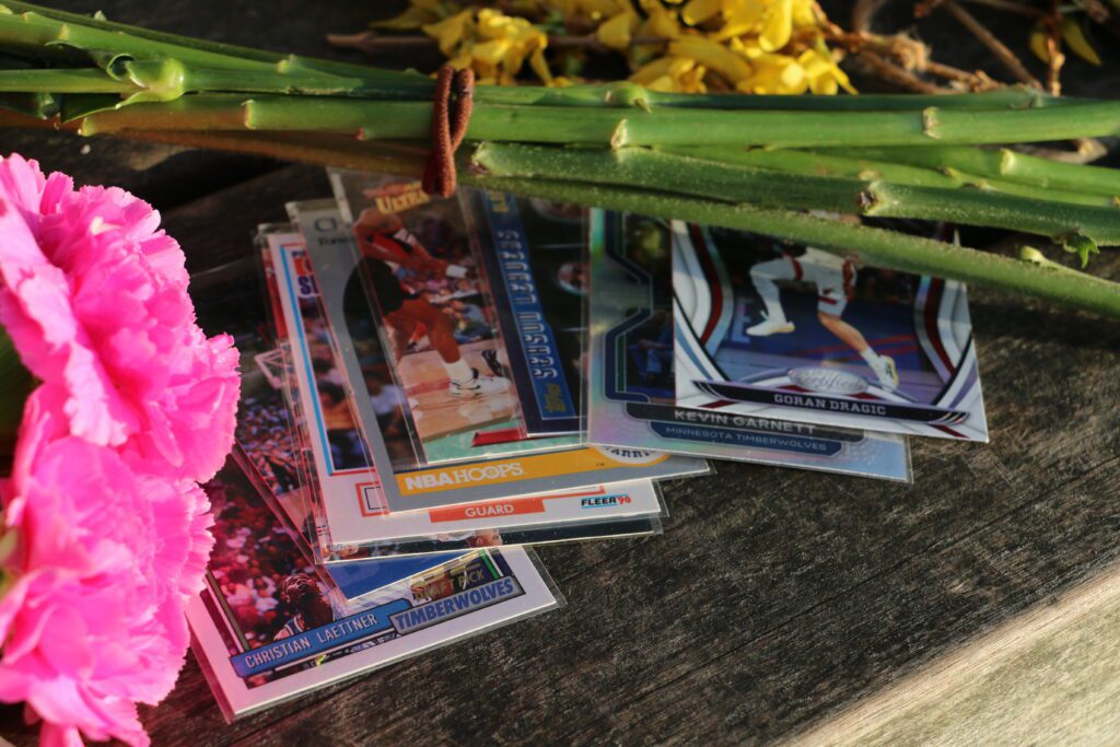 A couple left a stack of sports trading cards Henry King had given them underneath the flowers.