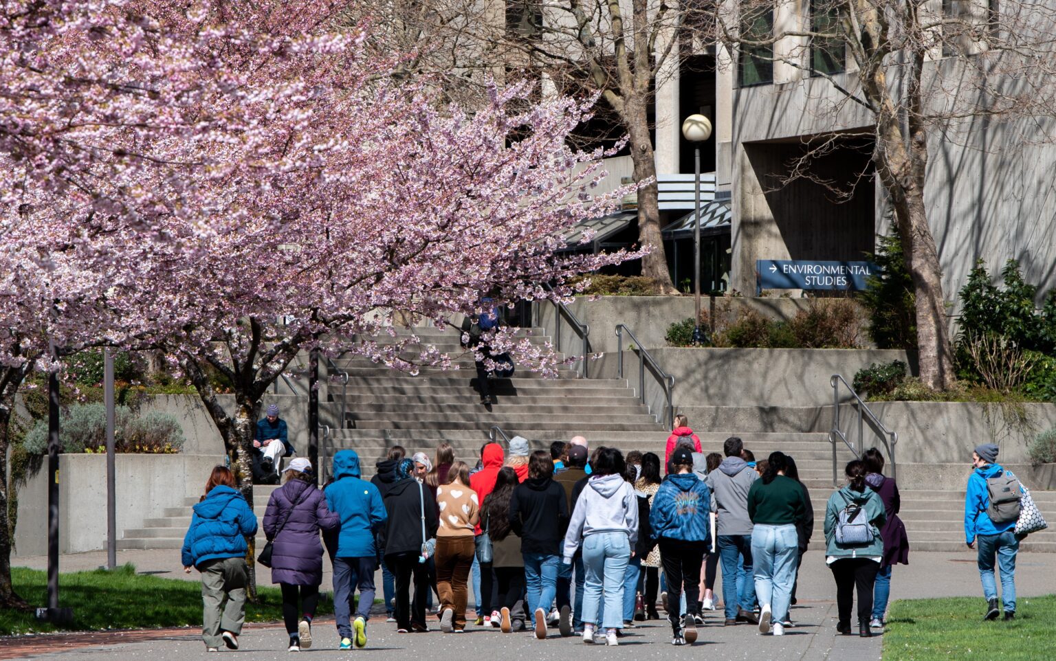 A tour group walks through Western Washington University. The U.S. Census Bureau found Whatcom County to have recovered from its population dip in 2021