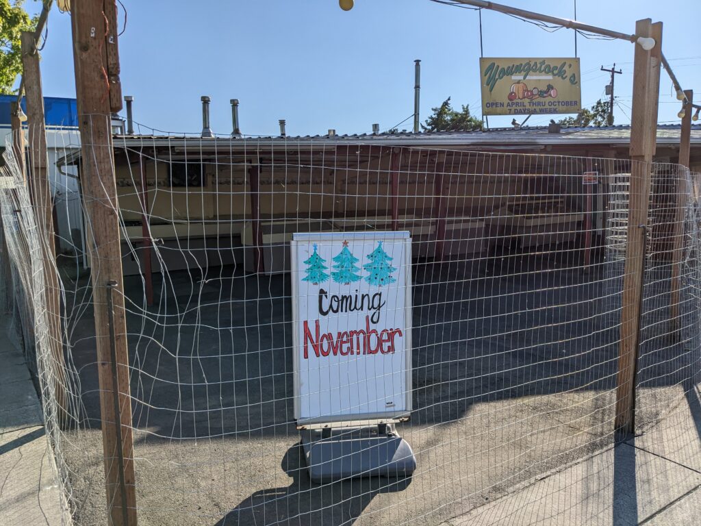 Sign outside of Youngstock's Nursery & Produce announcing its return in November.