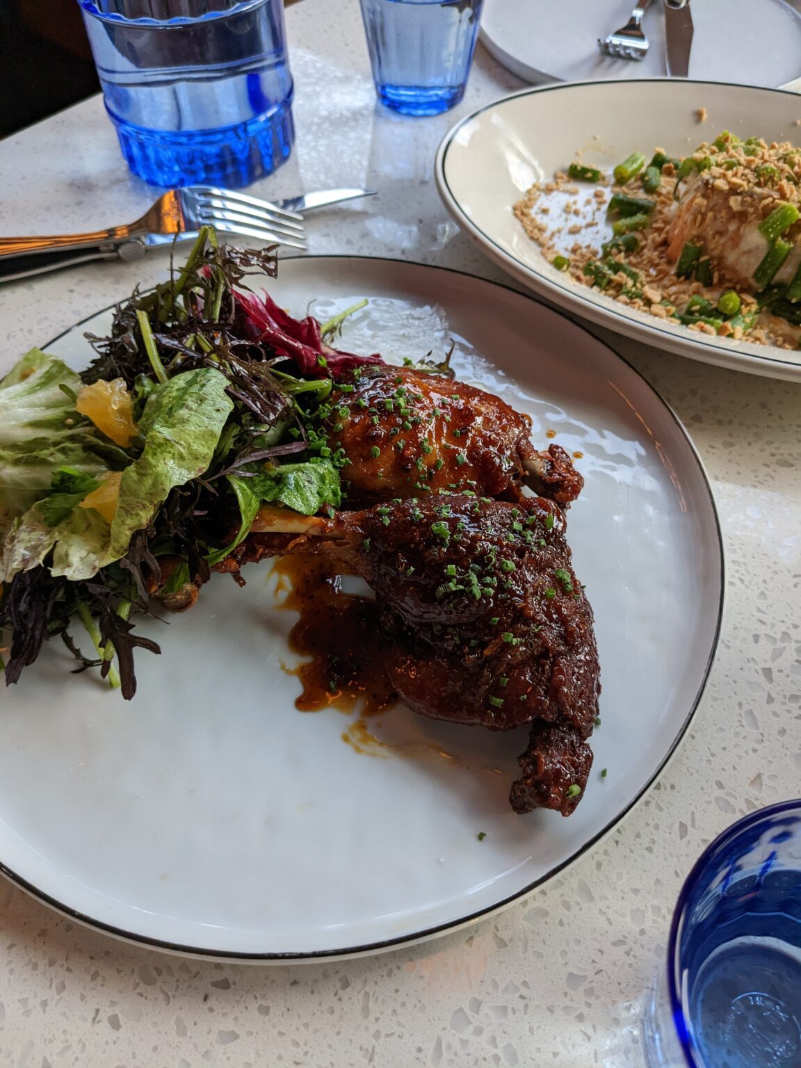 Among the many remarkable dishes at Estelle — a new French bistro and bar in Fairhaven — is the duck confit. The skin is crisped and the whole duck quarter is served with a sweet-and-sour orange gastrique sauce. Radicchio salad is served on the side.
