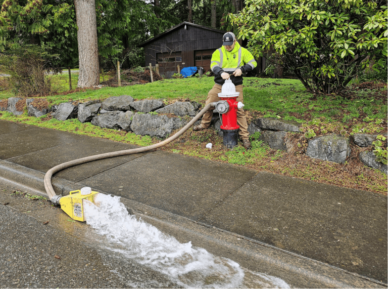 City crews flush the water main annually using de-chlorinated water to clear mineral deposits inside pipe walls.