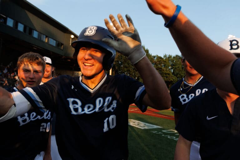 The Bellingham Bells' Max Hartman celebrates in the dugout July 6 after hitting a go-ahead solo home run in the seventh inning against the Kamloops NorthPaws. Hartman went 3-for-4 batting with two runs scored and an RBI in the Bells' 16-1 game-one win over the Port Angeles Lefties on Friday