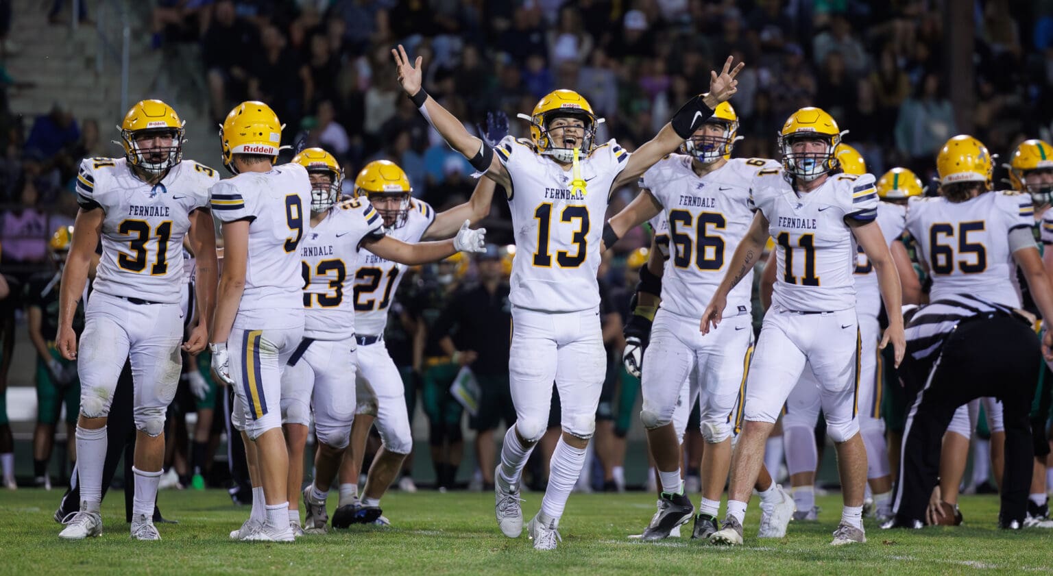 Ferndale’s Bishop Ootsey (13) celebrates with his teammates Friday