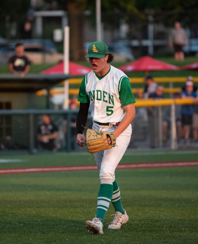 Lynden senior pitcher Lane Simonsen shouts after the game-ending out is recorded.