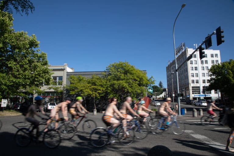 Dozens of bicyclists ride down Railroad Avenue in various states of nudity June 4 as part of the World Naked Bike Ride. The ride celebrated its 15th year with the theme “Safety and Respect for All Bodies