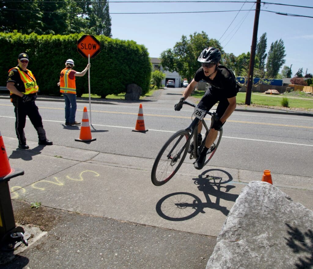 Ian Fay of Evil Bike Company flies off Marine Drive toward Little Squalicum Park during the cyclocross leg.