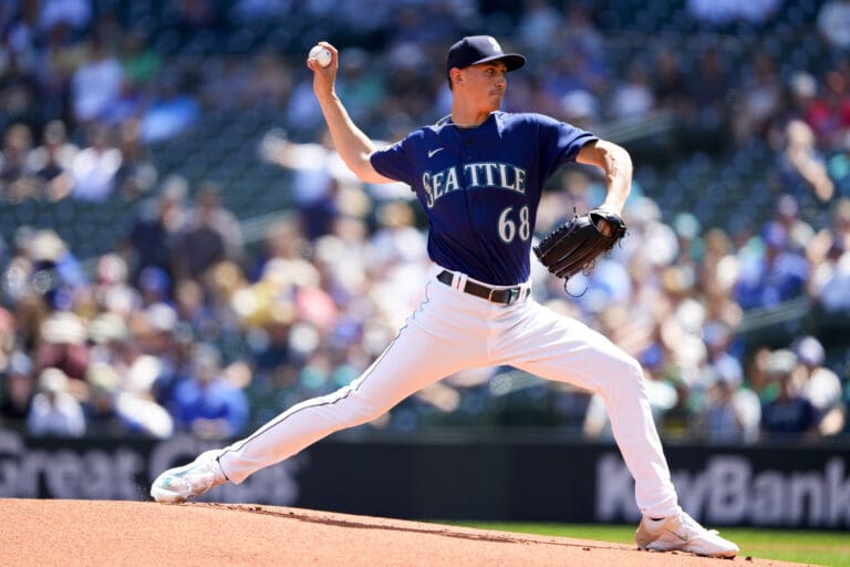 Seattle Mariners starting pitcher George Kirby throws against the Minnesota Twins during the first inning of a baseball game Thursday