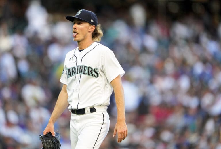 Seattle Mariners starting pitcher Bryce Miller reacts after pitching during the fourth inning of a baseball game against the Boston Red Sox