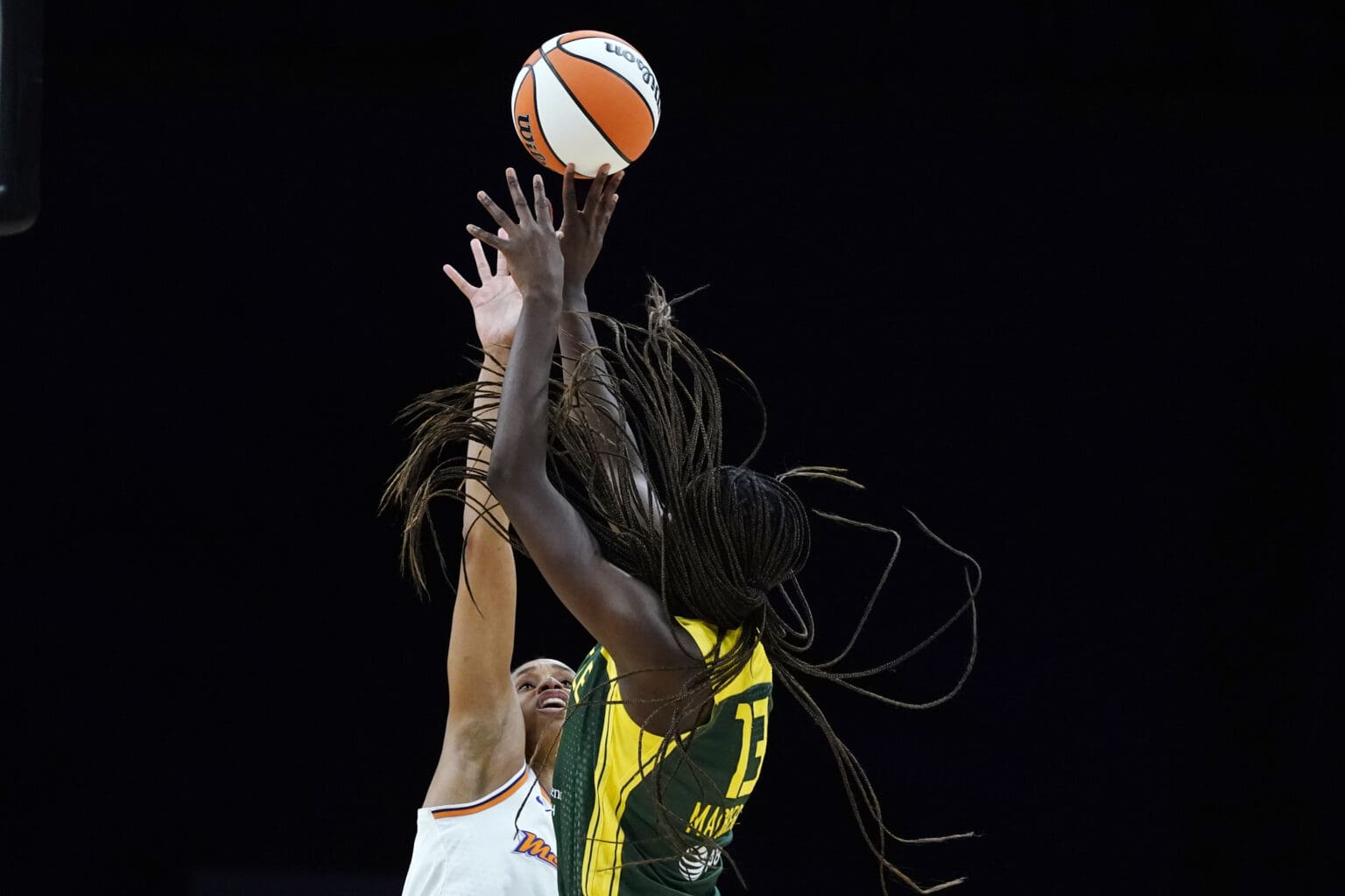 Seattle Storm center Ezi Magbegor shoots over Phoenix Mercury forward Brianna Turner during the second half of a WNBA basketball game Saturday