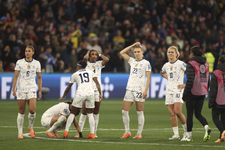 United States' players react after losing their Women's World Cup round of 16 soccer match against Sweden in a penalty shootout Sunday