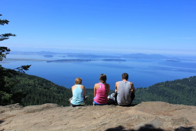A Trek for Treasure team stops for a break on the Oyster Dome hike. Trek for Treasure takes people in Skagit and surrounding counties on six hikes