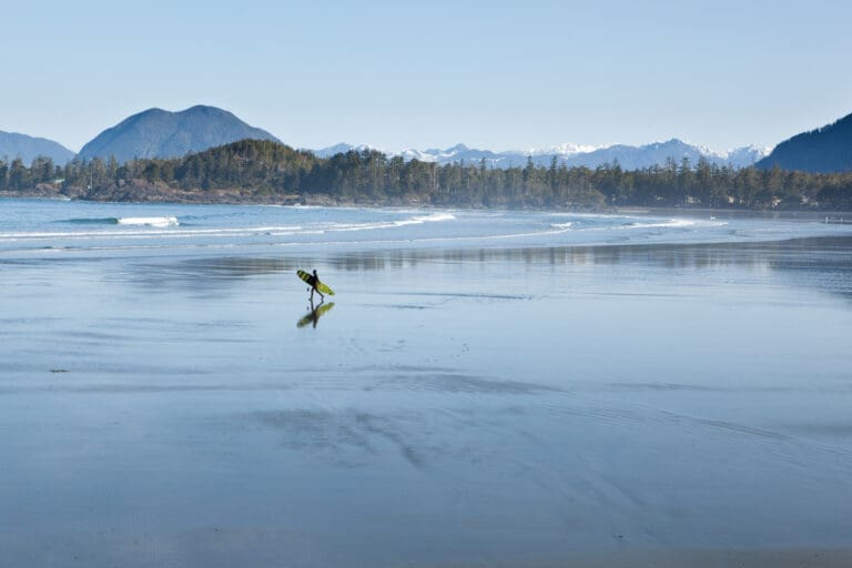 Tofino's wide expansive beaches have the same color as the ocean.