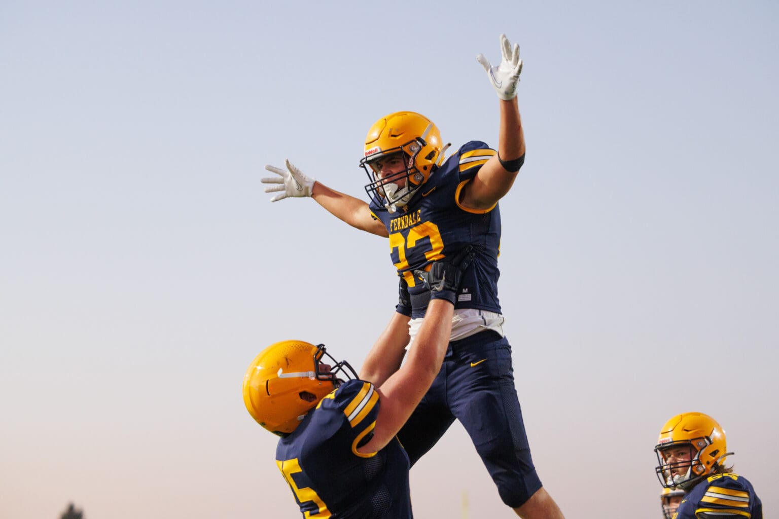 Ferndale’s Phoenyx Finkbonner is lifted into the air Sept. 15 after scoring a touchdown in Ferndale’s 22-16 win over Glacier Peak. The Golden Eagles will host Timberline for their week 10 playoff game with a 3A state tournament berth on the line.