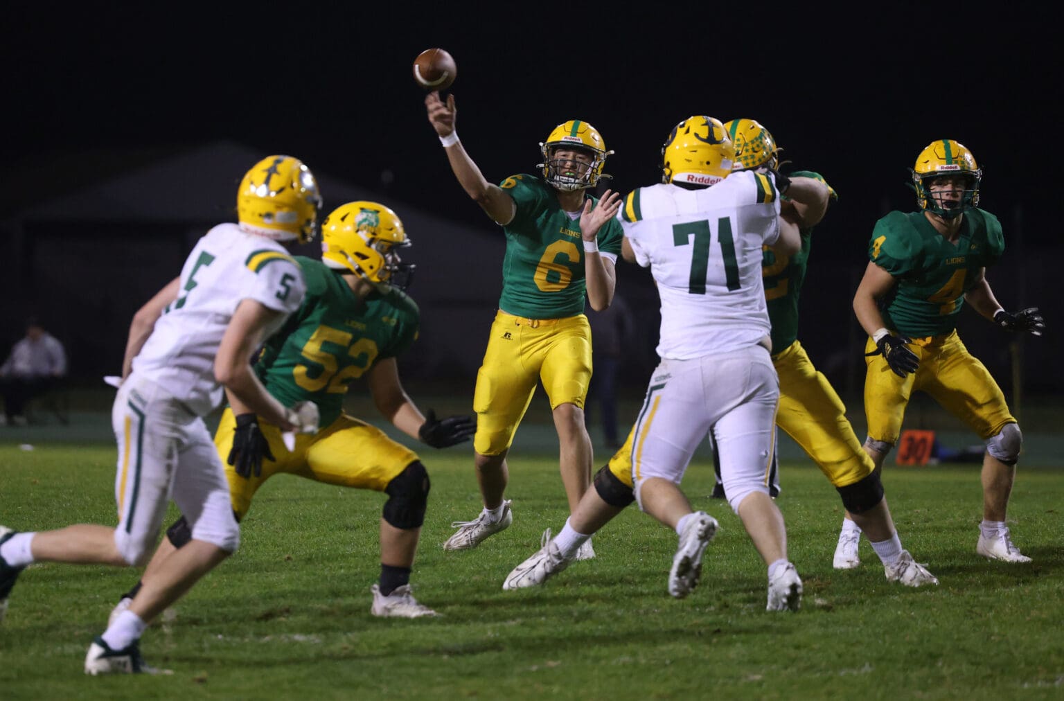 Lynden’s Brant Heppner throws a touchdown pass Sept. 29 during a game against Sehome.