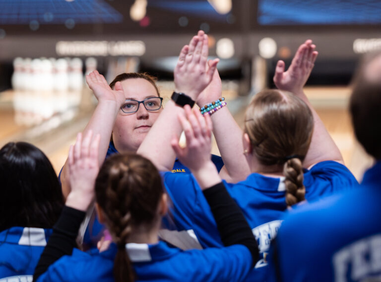 Ferndale sophomore Madison McFadden gets high-fives from her teammates Tuesday, Jan. 23 during the District 1 girls bowling at Riverside Lanes in Burlington. McFadden tallied a cumulative 637 points to earn the district title and a spot at state.