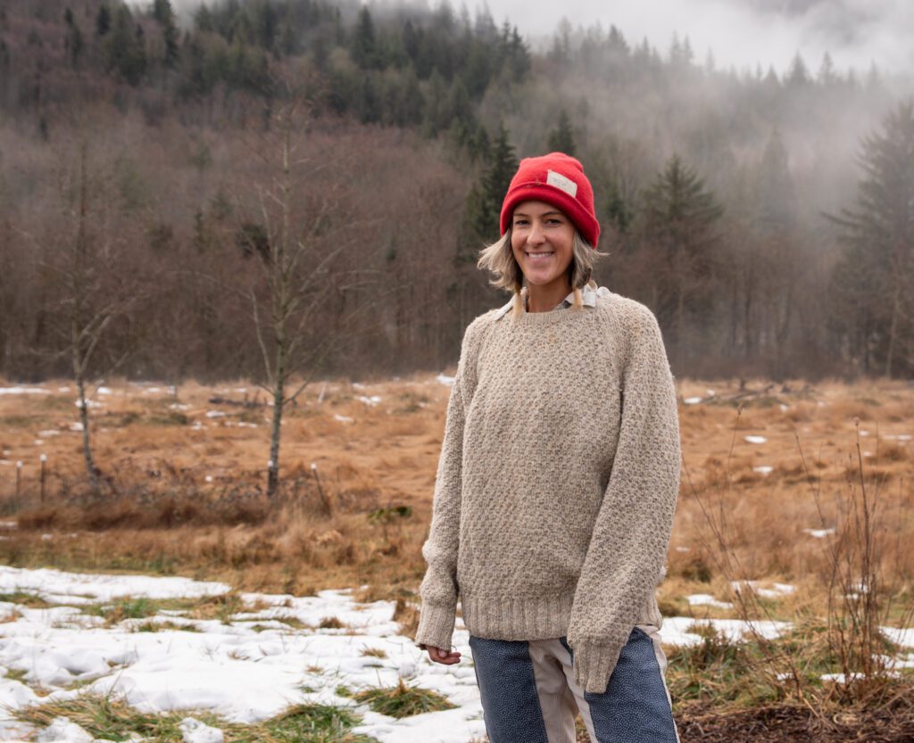 Suzanne Lundberg stands on her property in Sumas Jan. 29 where she lives and creates products for her business The Goat's Coat. Lundberg sells cashmere hats, jewelry and other up-cycled clothing online and at markets. In the coming years, she and her husband hope to host nature retreats and art workshops on their farmstead.