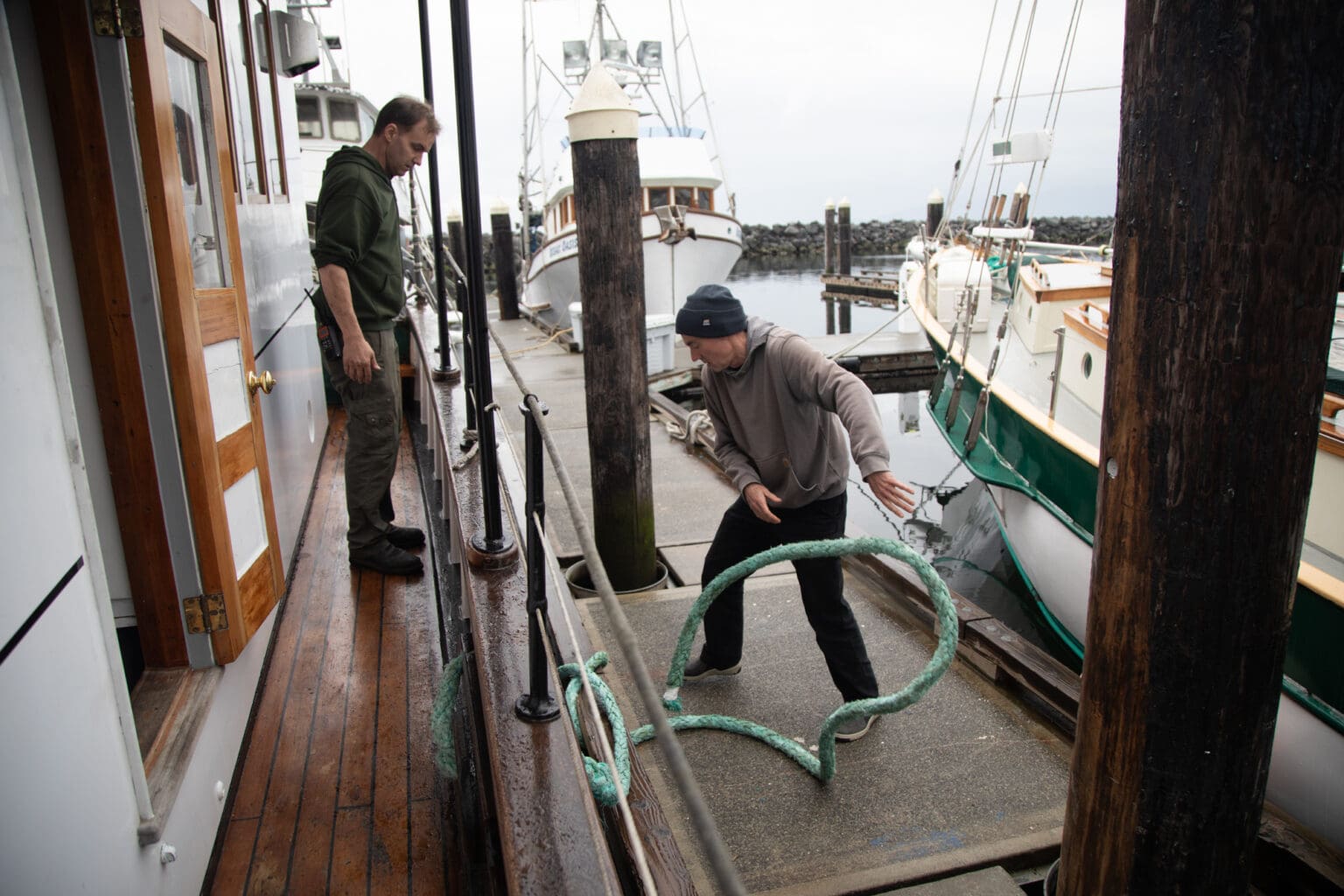 Captain Jeffery Smith, left, and Tom Riley untie the David B from its slip at Squalicum Harbor.