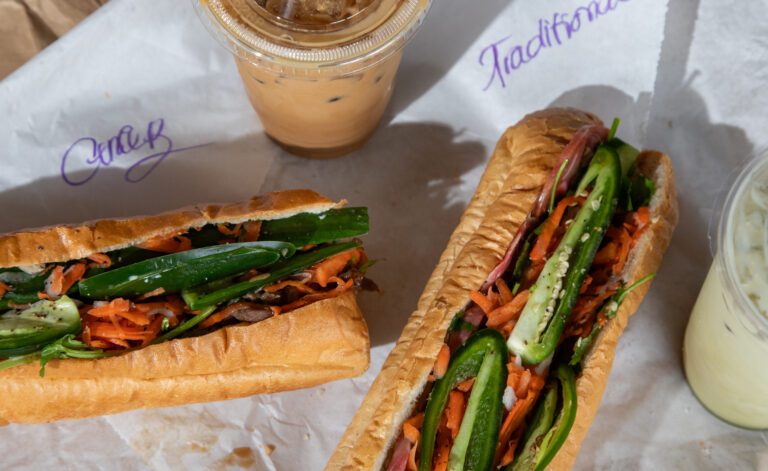 Banh Mi & Bubble Tea includes a range of Vietnamese sandwiches, including a grilled pork, left, and a traditional banh mi. The food truck is located at a 76 gas station on Meridian Street.