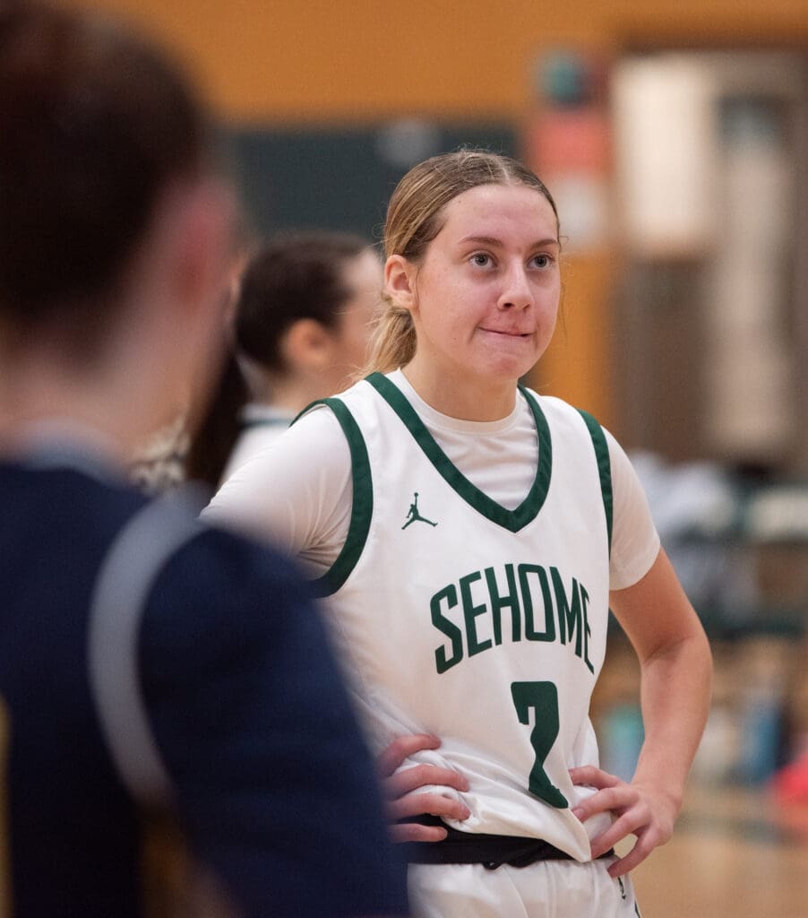 Sehome senior guard Madi Cooper looks up at the scoreboard late in the fourth quarter.