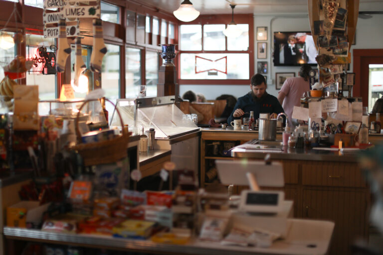 Nelson's Market customers enjoy their breakfasts on Wednesday morning before beginning their day.