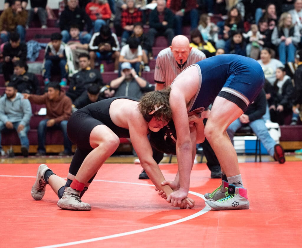 Mount Baker's Dylan Moa grapples with his Glacier Peak opponent.