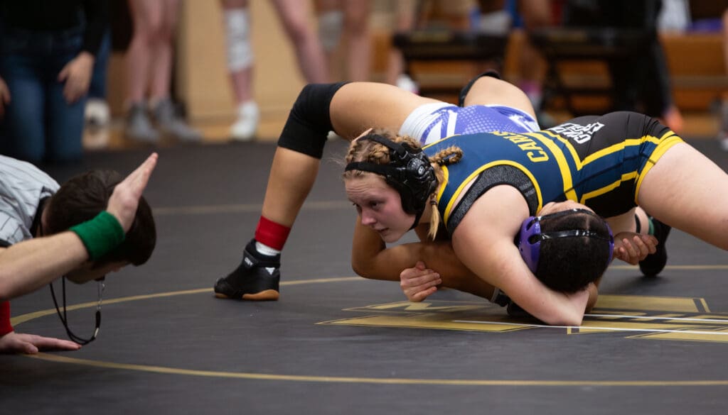 Ferndale's Cecelia Carlson watches the referee count the seconds of her pin.