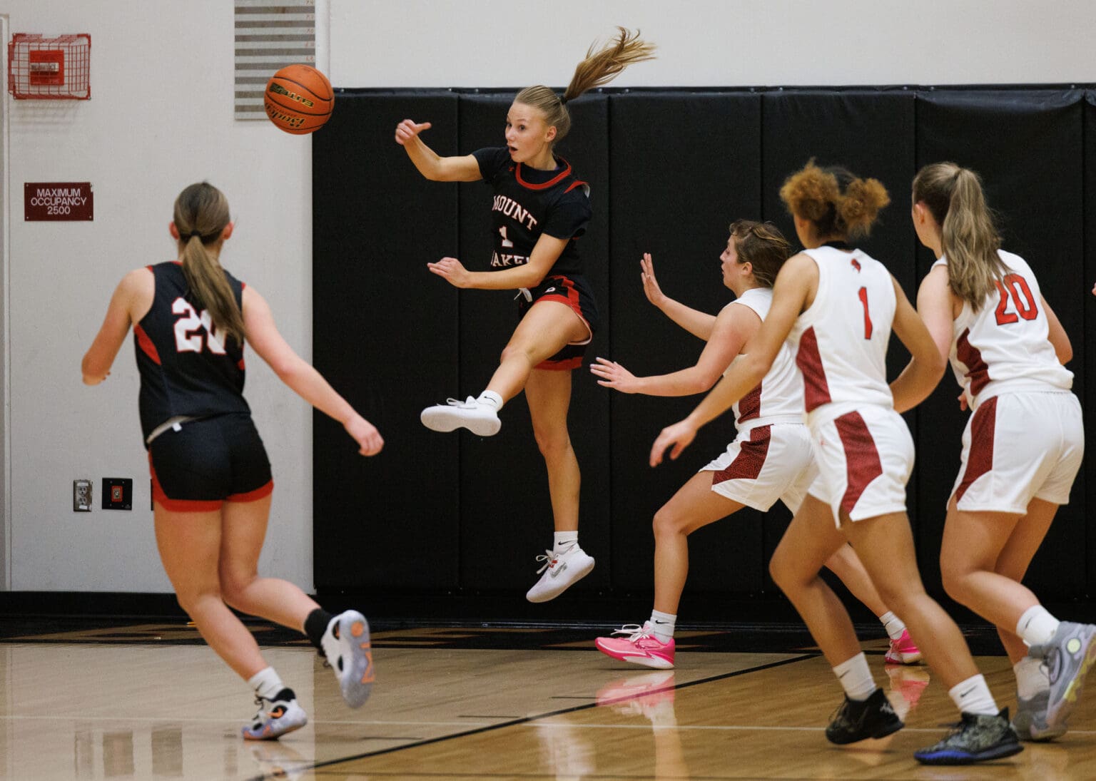 Mount Baker’s Natalie Van Liew leaps and keeps the ball in play Wednesday