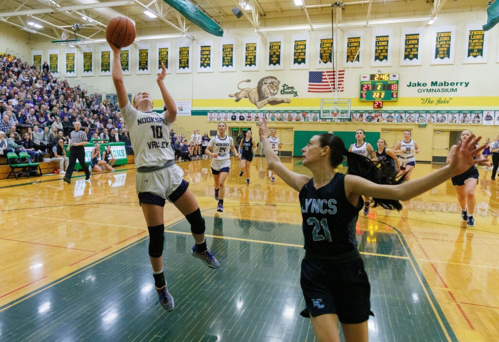 Nooksack Valley’s Lainey Kimball attempts to take shot as a defender looks back.