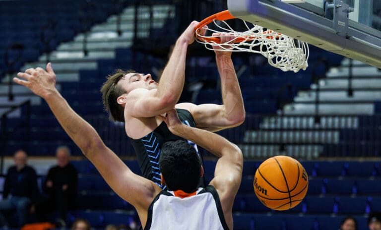 Western Washington University's Liam Clark slam dunks the ball Saturday