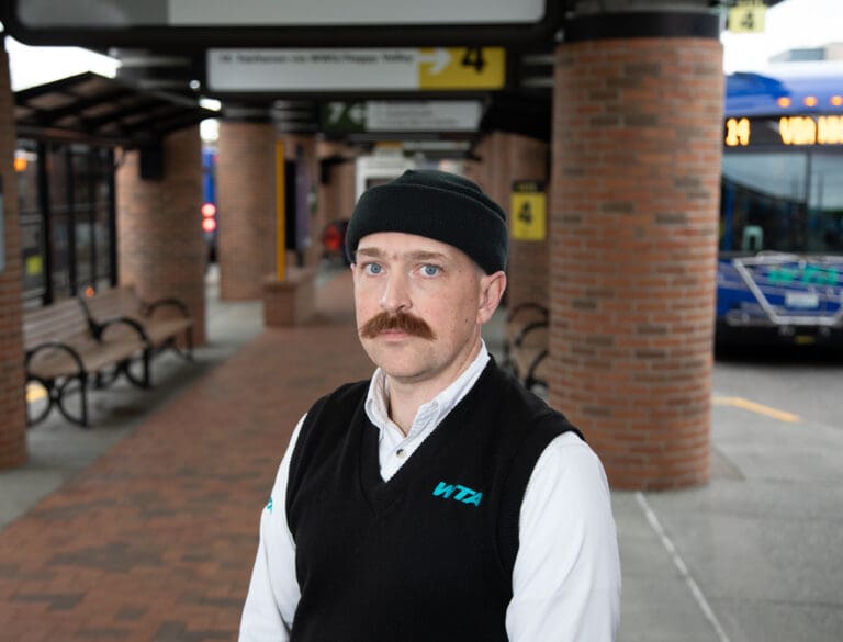 Whatcom Transportation Authority Terminal Expeditor Andrew Butcher poses for a photo at downtown bellingham bus station.