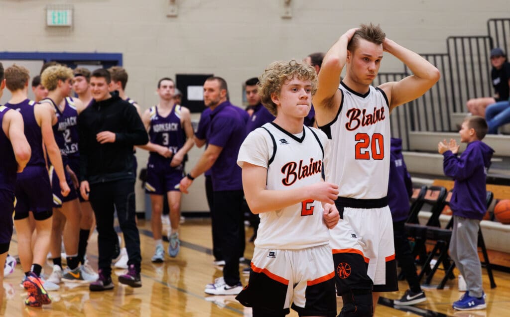 Blaine’s Daniel Banks, left, and Conner Dalry react after the tight loss.