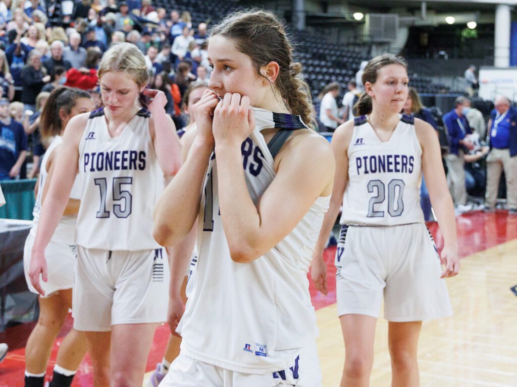 Nooksack Valley’s Devin Coppinger reacts as she pulls her jersey up to her mouth.