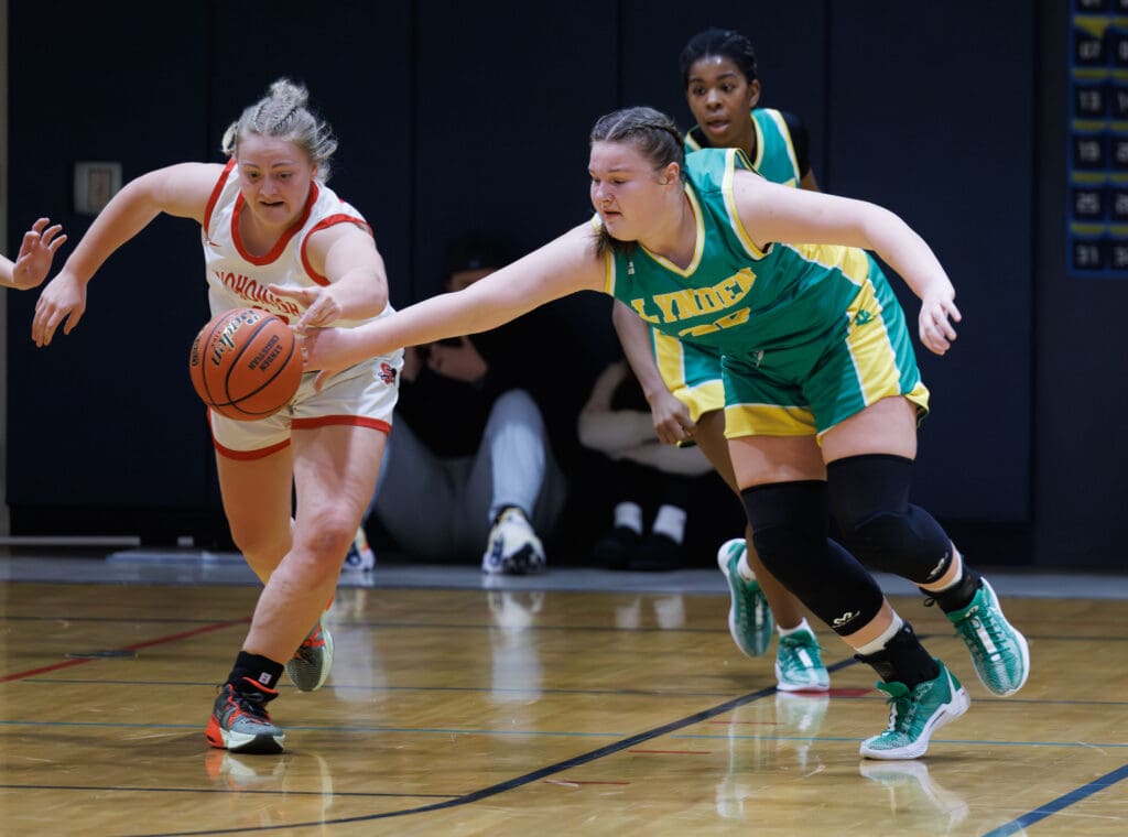 Lynden’s Payton Mills reaches for a loose ball.
