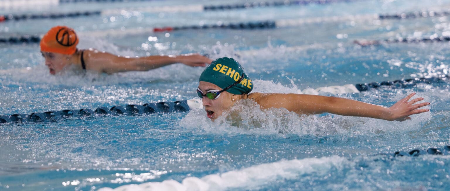 Sehome’s Jordis Darroch pulls ahead of Blaine's Hailey Ferrell in the 100-yard butterfly Oct. 17 during a dual meet. Darroch and Ferrell each earned multiple entries to the 2A state meet