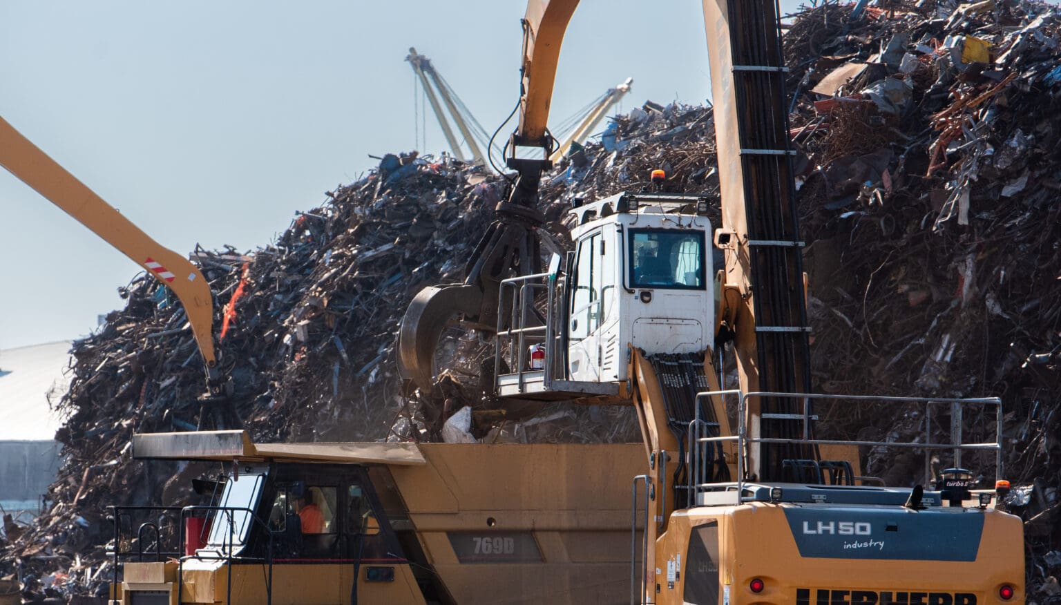 An excavator places scrap metal in a dump truck Sept. 21 at the Bellingham waterfront. A guest commentary about ABC Recycling's plans for the operation left out critical information