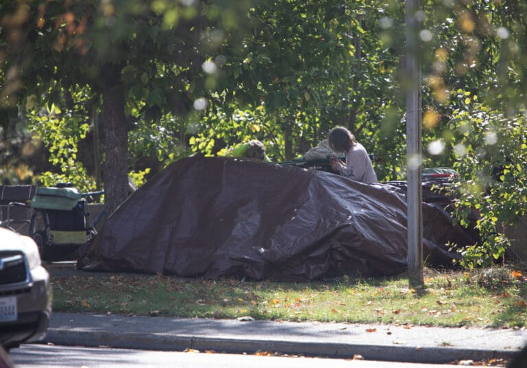 People reside in tents off of Dupont Street. A recent University of British Columbia study suggests that giving a substantial sum of cash to homeless people helps them spend fewer nights on the streets.