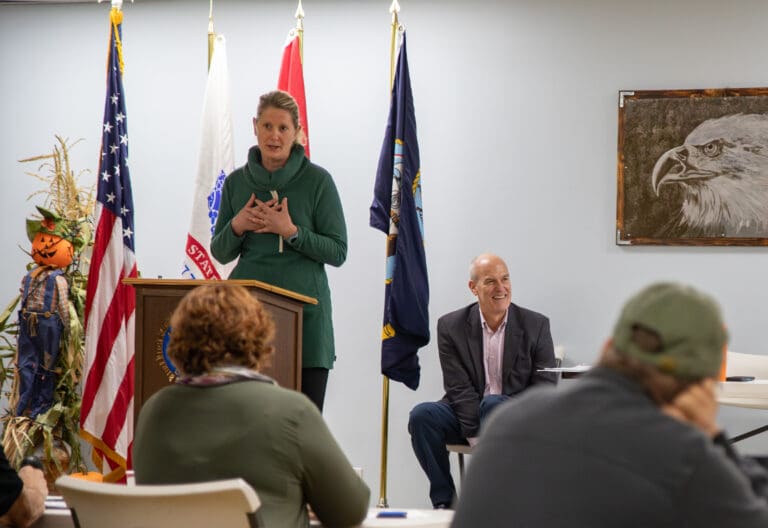 Whatcom County veterans specialist Elizabeth Witowski speaks about the needs of local veterans at a forum hosted by U.S. Representative Rick Larsen on Monday