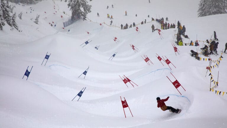 Kari Hoss of Glacier carves through the Legendary Banked Slalom on Feb. 4 at Mount Baker Ski Area. The annual snowboard race returned for its 35th year after a two-year gap due to the COVID-19 pandemic.