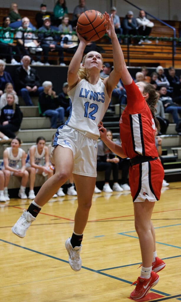 Lynden Christian’s Ella Fritts puts in a fourth-quarter layup.