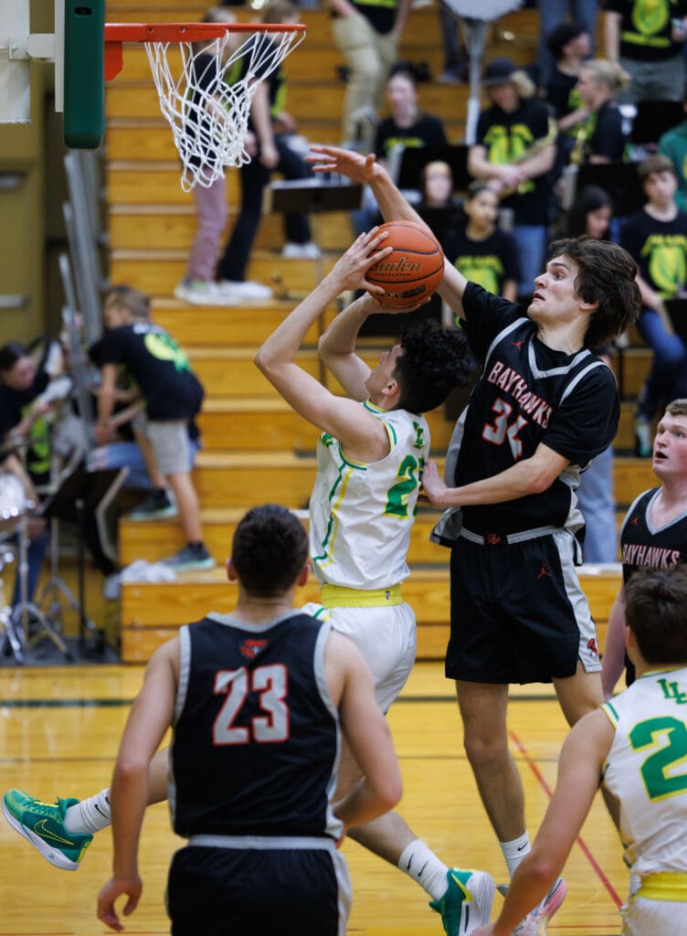 Bellingham’s Kincade Vanhouten fouls Lynden’s Anthony Cananles as he shoves him from behind in an attempt to reach the ball.