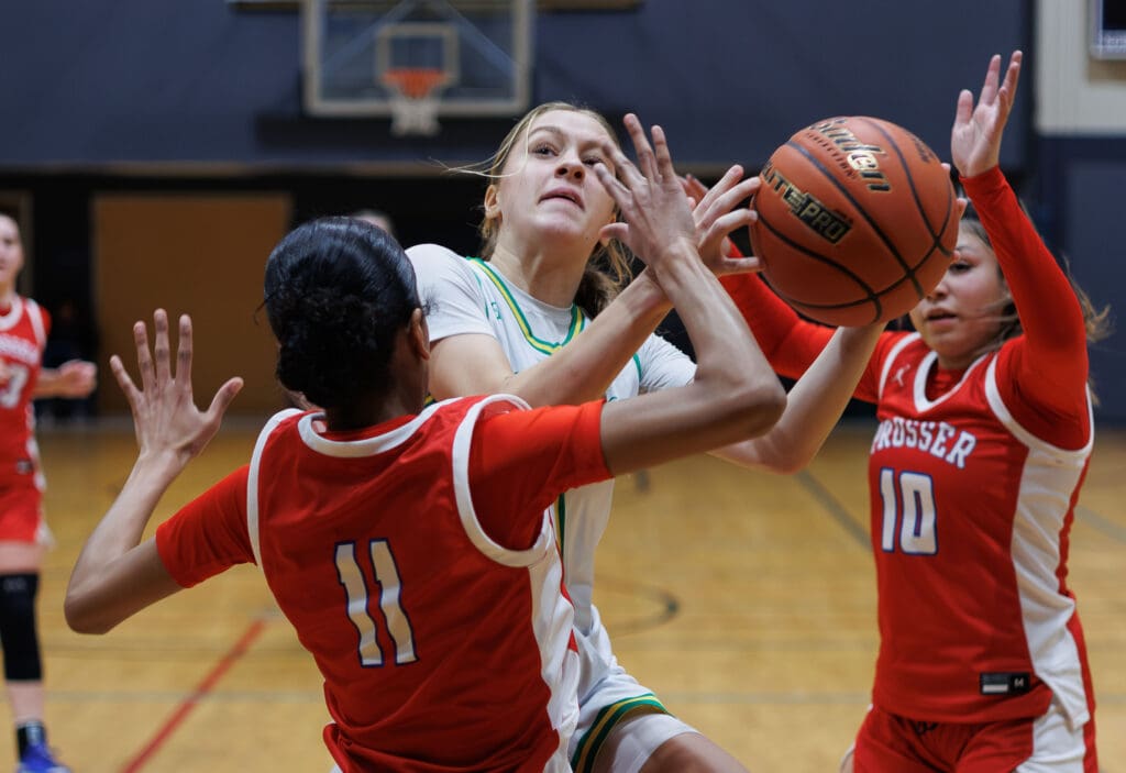 Lynden’s Mallary Villars is fouled as she drives to the basket.