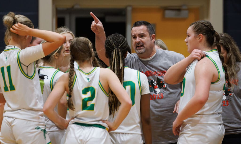 Lynden head coach Rob Adams gives instructions during a timeout.