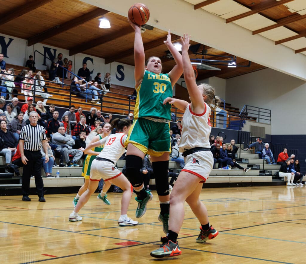 Lynden’s Payton Mills makes a contested bucket in the paint.