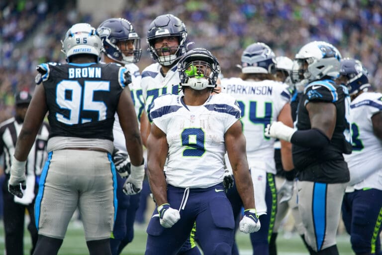 Seattle Seahawks running back Kenneth Walker III celebrates after scoring against the Carolina Panthers during the second half of an NFL football game Sunday