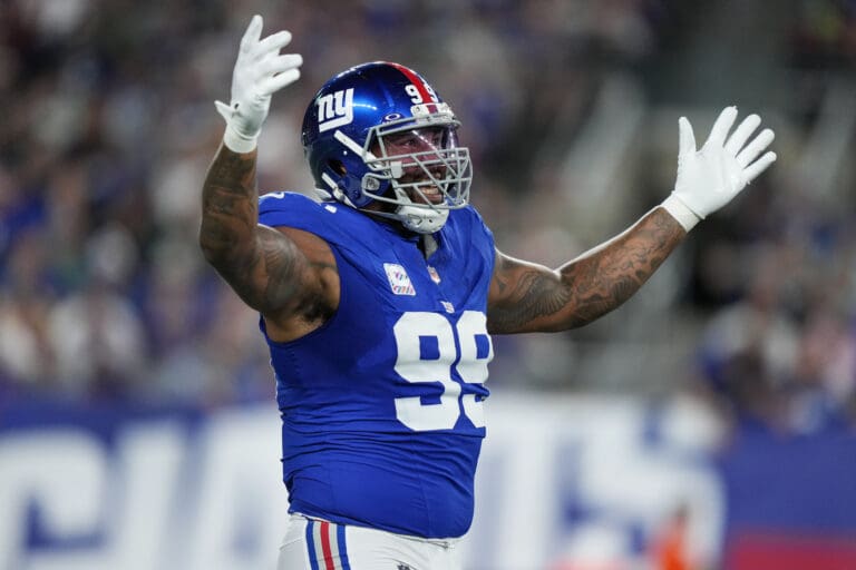 New York Giants defensive end Leonard Williams (99) reacts with his hands in the air.