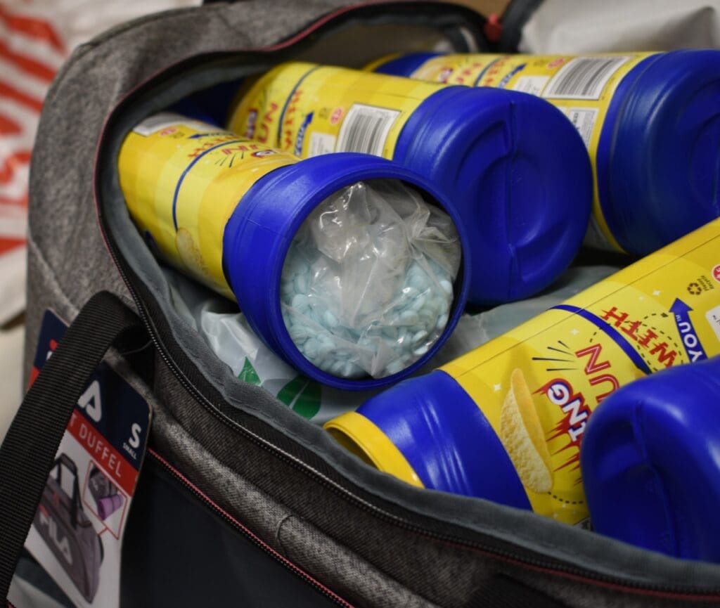 A bag full of potato chip containers containing fentanyl.