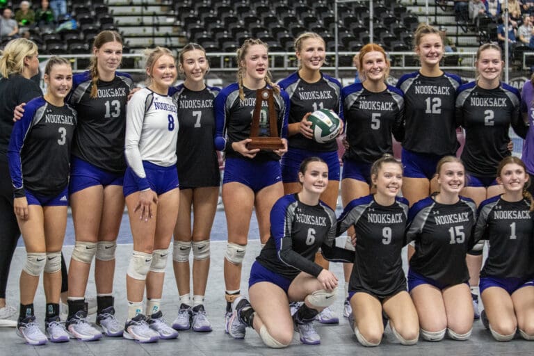 Nooksack Valley players pose with their sixth-place trophy Saturday