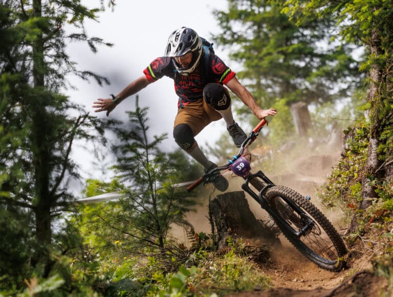 Rowdy Thompson leaps off his bike as he misjudges a section of Spacewolf, a route of an Enduro race at Galbraith Mountain, during the NW Tune Up.